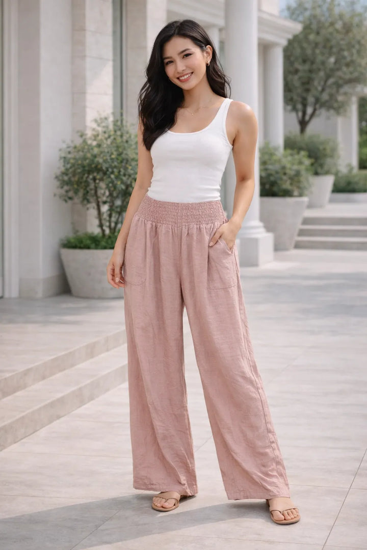 Pink wide leg smocked waistband trousers for women UK